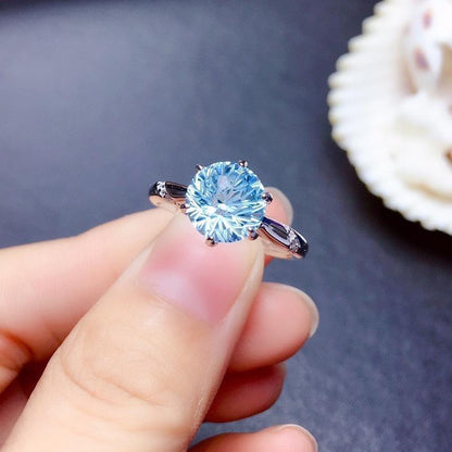 SILVER BLUE TOPAZ SOLITAIRE RING - (ADJUSTABLE)