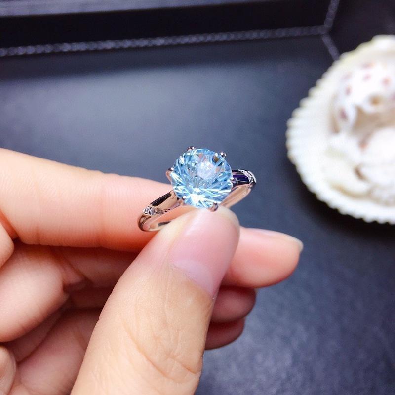 SILVER BLUE TOPAZ SOLITAIRE RING - (ADJUSTABLE)