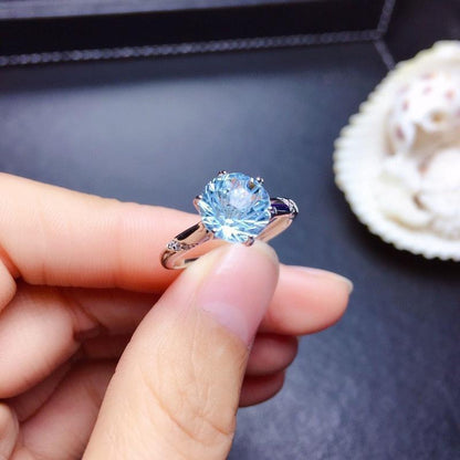 SILVER BLUE TOPAZ SOLITAIRE RING - (ADJUSTABLE)