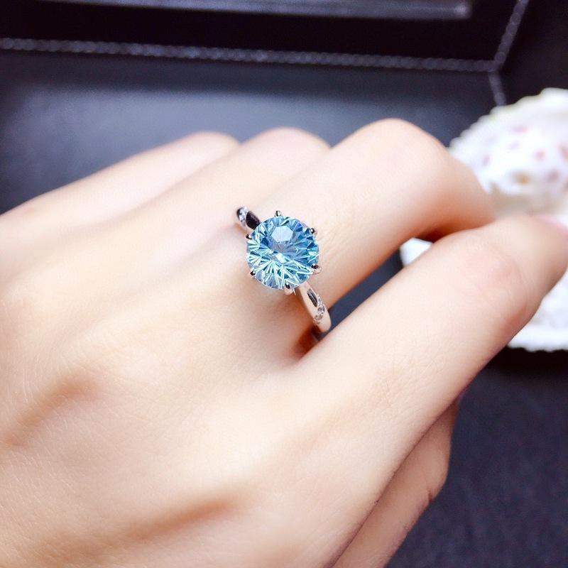 SILVER BLUE TOPAZ SOLITAIRE RING - (ADJUSTABLE)