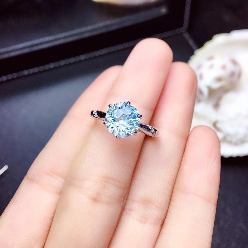 SILVER BLUE TOPAZ SOLITAIRE RING - (ADJUSTABLE)