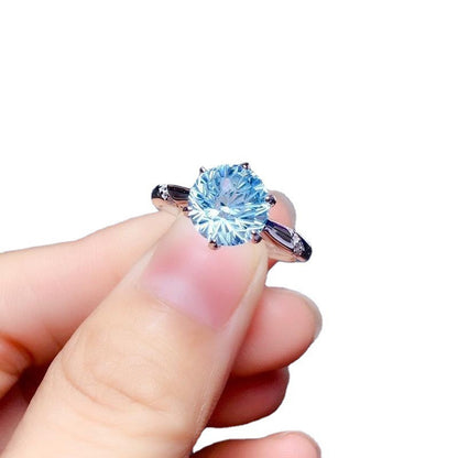 SILVER BLUE TOPAZ SOLITAIRE RING - (ADJUSTABLE)