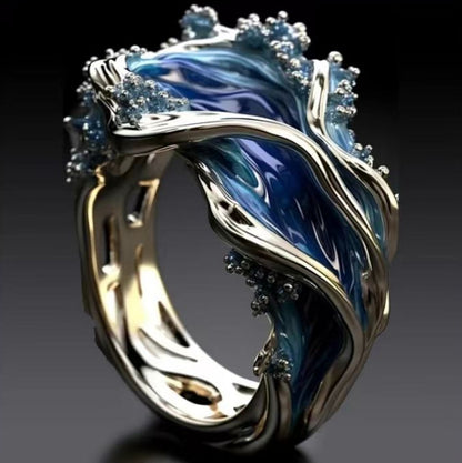 SILVER BLUE TOPAZ OCEAN WAVE RING - (ADJUSTABLE)